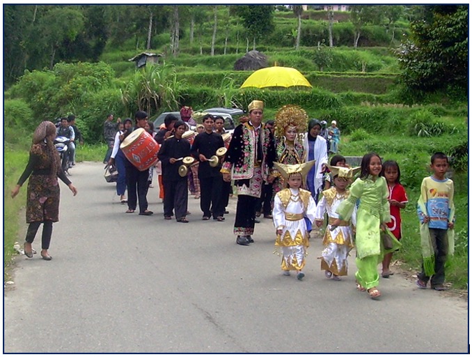 Traditional procession with Minangkabau talempong music in West Sumatra, Indonesia